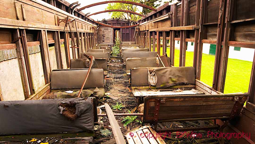 A railway carriage in ruins